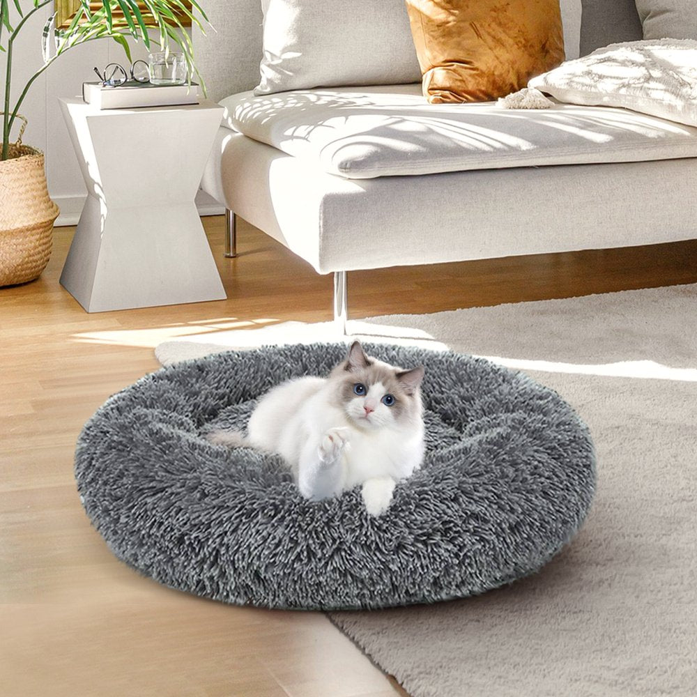 Calming Dog & Cat Bed, Anti-Anxiety Donut Cuddler Warming Cozy Soft round Bed, Fluffy Faux Fur Plush Cushion Bed for Medium Small Dogs and Cats, 24"